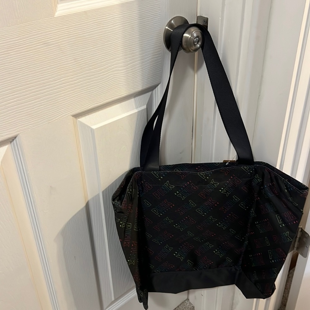 NWT black pink canvas bag.  Fluorescent colors pink, green blue & purple.